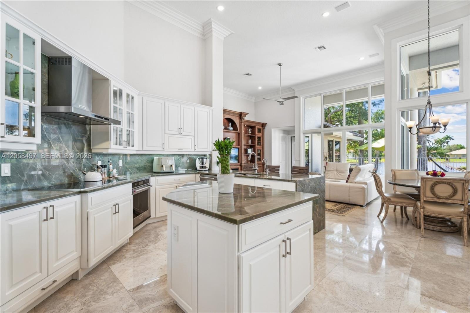 Chef's kitchen with marble island